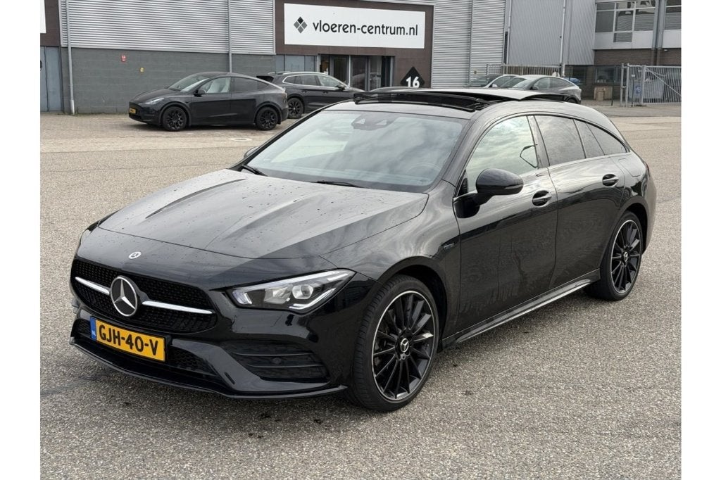 Mercedes-Benz CLA 250 e 218pk 8G-DCT 2021 Zwart, Auto's, CLA, Parkeerassistent, 4 cilinders, Leder en Stof