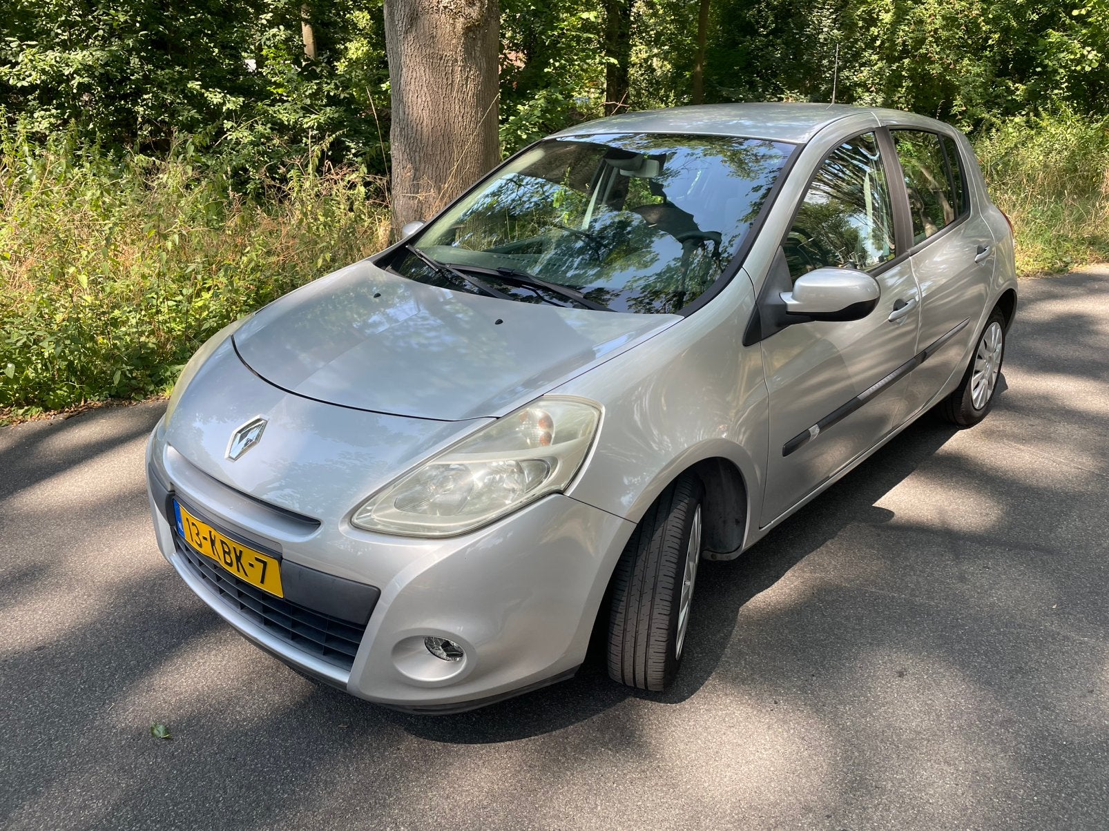 Renault Clio 1.2 16V 55KW 5-DRS E4 2009 Grijs, Auto's, Voorwielaandrijving, 74 pk, 4 cilinders, 1200 kg