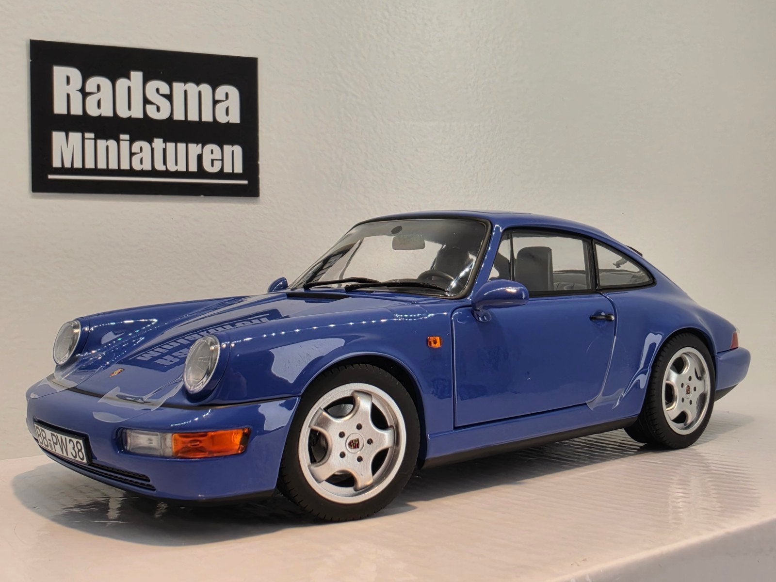 Porsche 911 (964) Carrera 4 - Maritim blue - 1:18 Norev, Auto, Nieuw, Norev, Ophalen of Verzenden