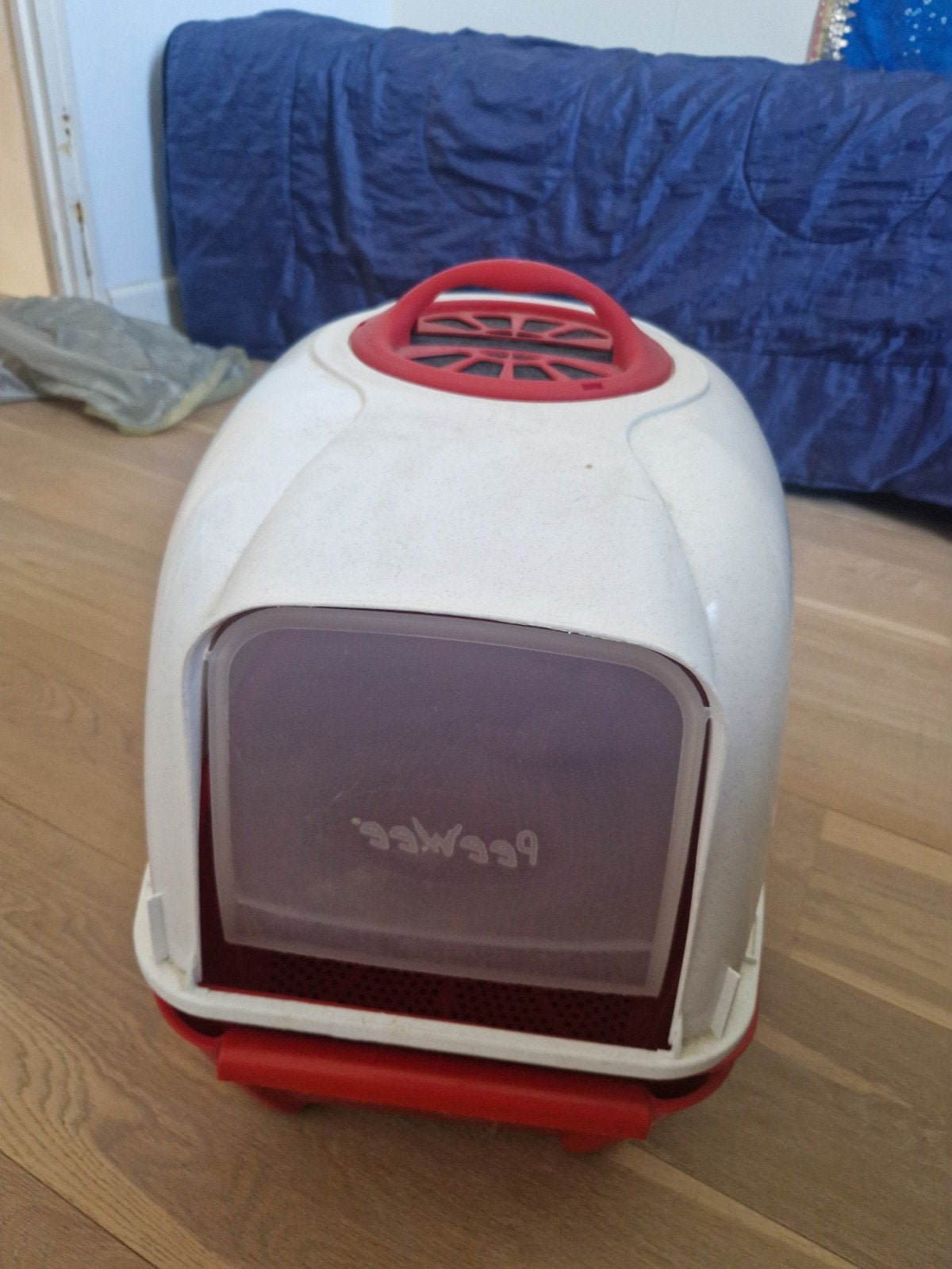 Peewee kattenbak, Ophalen