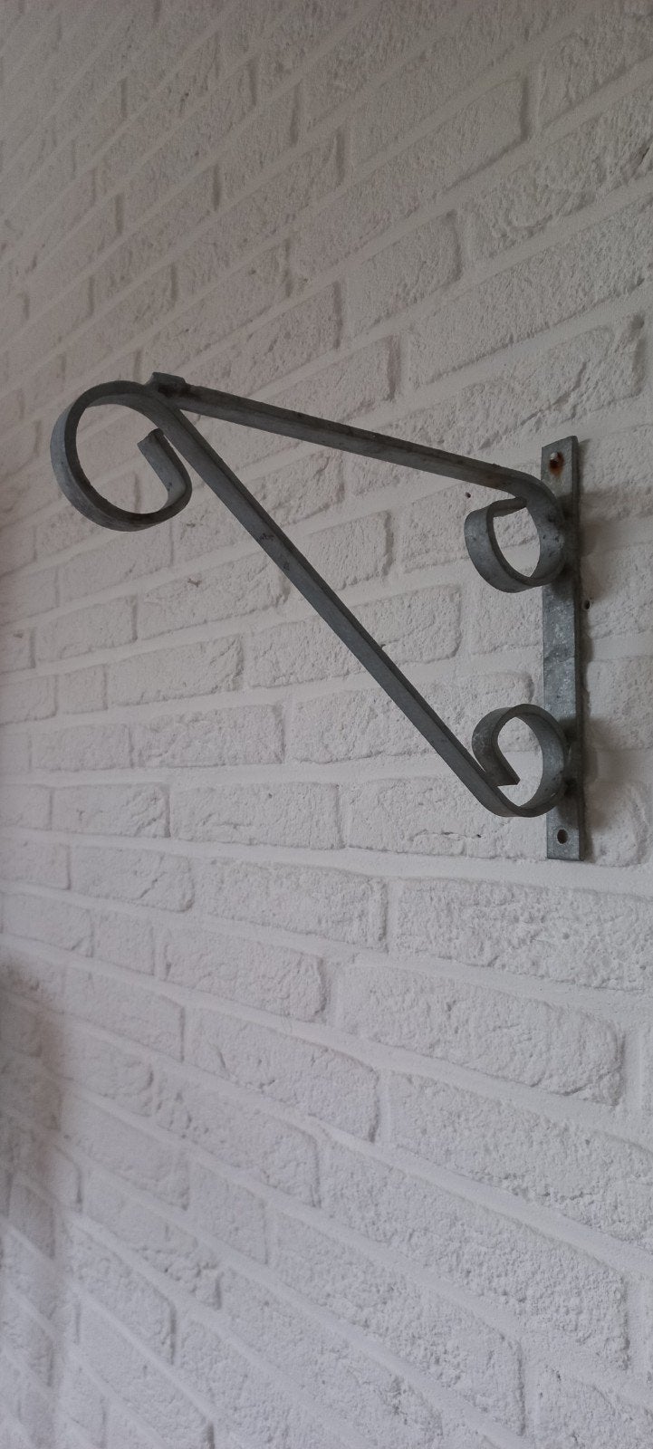 Metalen plantenbakhaak / muurbeugel, Tuin en Terras, Ophalen of Verzenden, Gebruikt