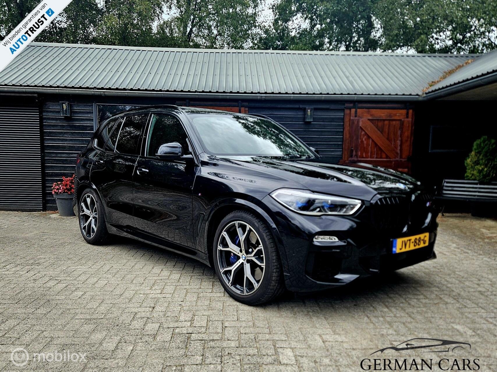 BMW X5 xDrive45E High Executive Hybride 394PK | SKY Lounge, Auto's, Automaat, Lederen bekleding, Zwart, Leder