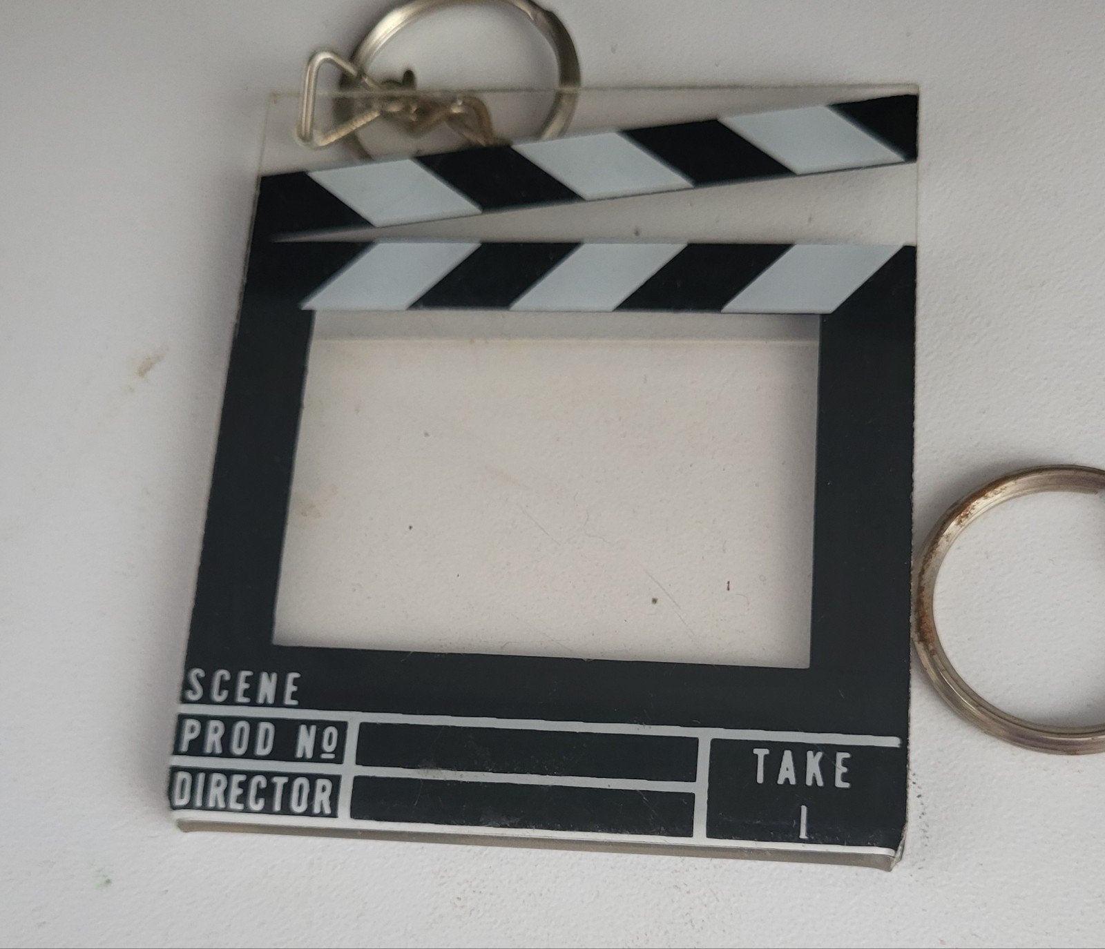 Sleutelhanger filmklapper, Ophalen of Verzenden, Gebruikt, Overige typen