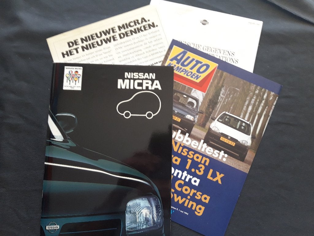 Nissan Micra folderset Auto van het Jaar 1993, Ophalen of Verzenden, Zo goed als nieuw, Nissan