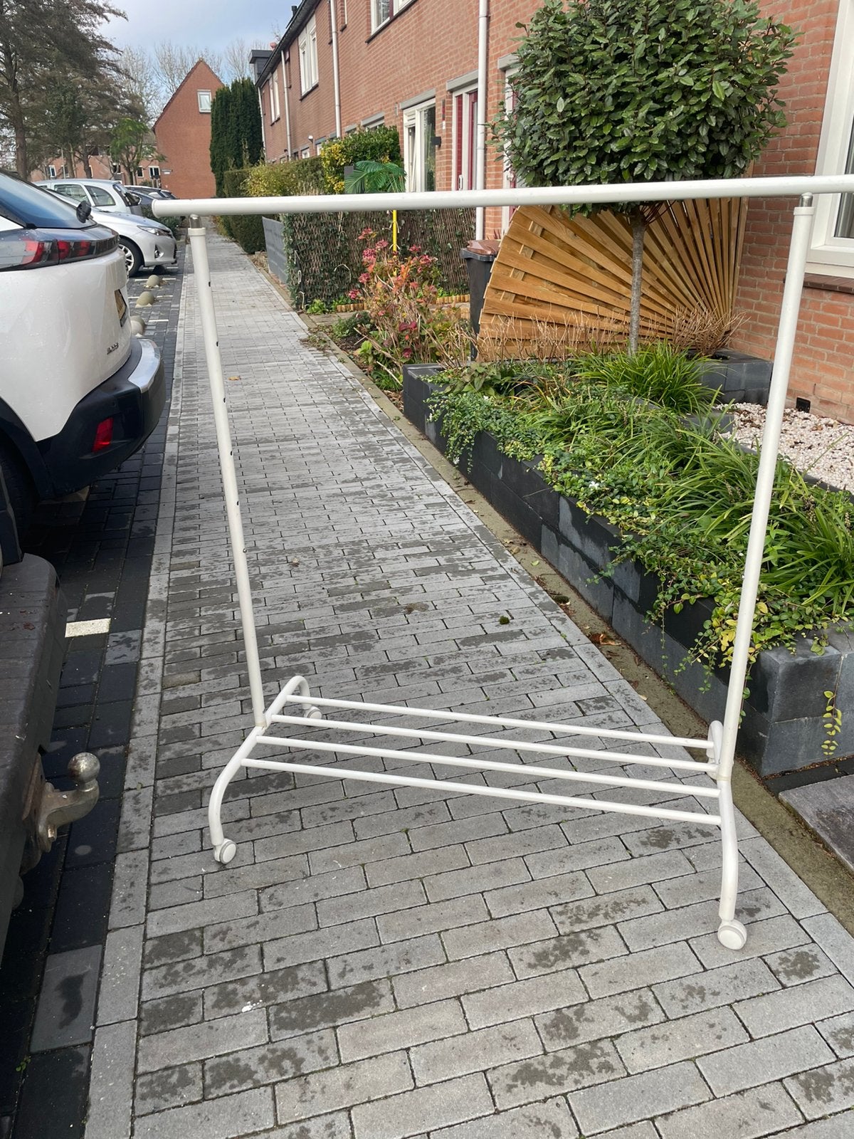 kledingrek, Ophalen, Zo goed als nieuw