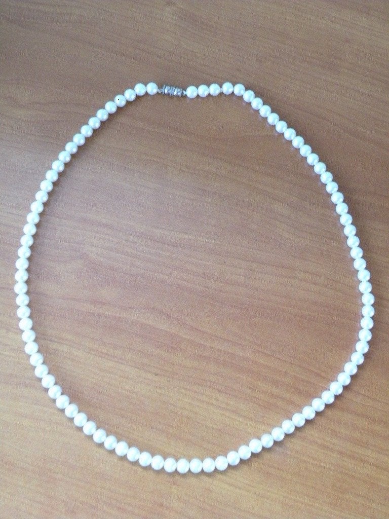 Parelketting, wel mooi, niet echt. Lengte 73 cm., Sieraden, Tassen en Uiterlijk, Antieke sieraden, Ophalen of Verzenden, Overige materialen