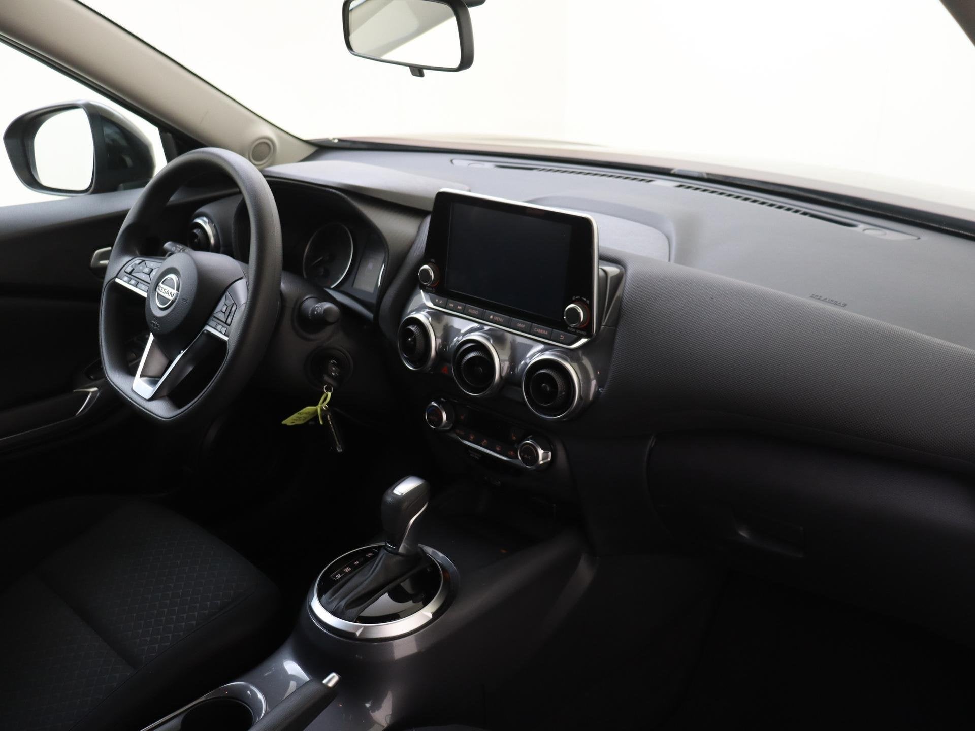 Foto 12 van Nissan Juke 1.0 DIG-T Acenta | Achteruitrijcamera | Wieldopp