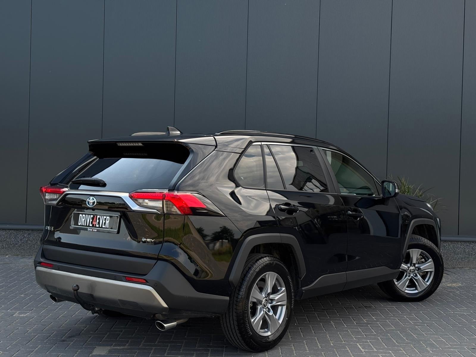 Toyota RAV4 2.5 MHEV Dynamic 2025 GARANTIE | TREKHAAK | NAVI, Automaat, Stof, Gebruikt, Zwart