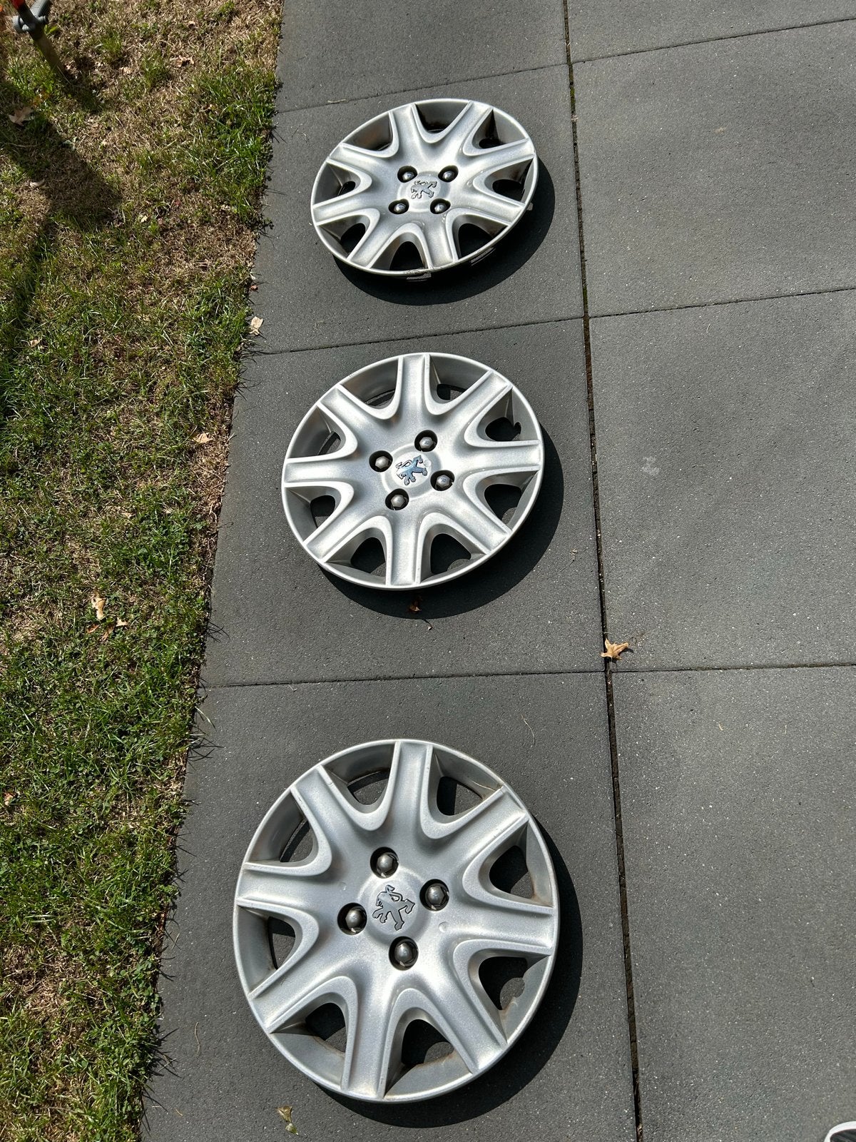 Orginele set van 3 Peugeot wieldoppen 206 SW, Ophalen of Verzenden, Gebruikt