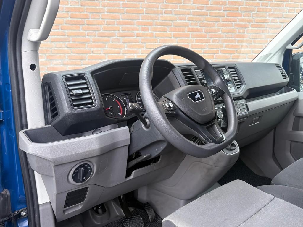 MAN TGE 2.0 140PK Automaat L3H3 / 2x Schuifdeur / Distronic, Auto's, Stof, Gebruikt, Huisgarantie, 4 cilinders