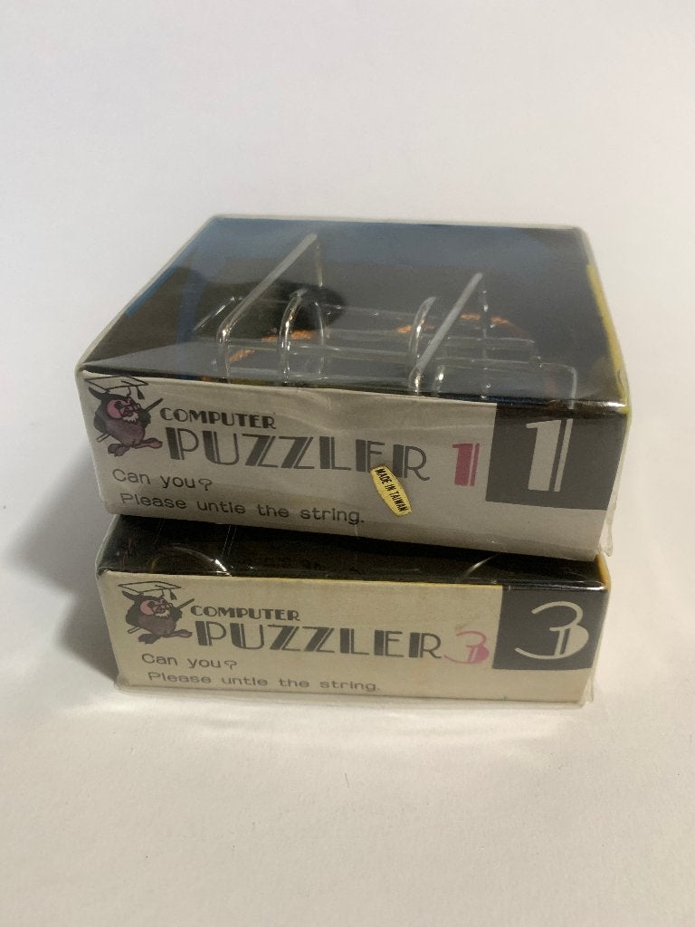 2 Puzzels Puzzler 1 en 3 - metalen vorm, ringen en koord, Ophalen of Verzenden, Minder dan 500 stukjes, Nieuw, Rubik's of 3D-puzzel