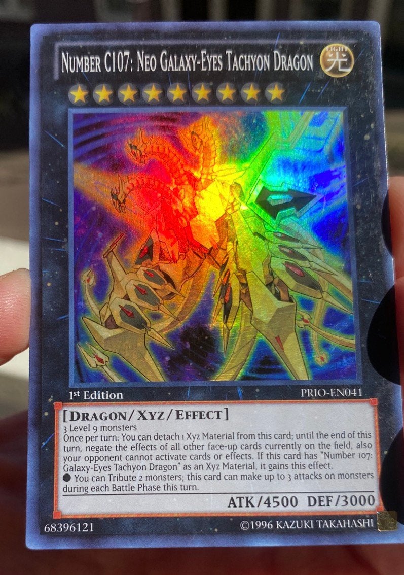 Yu-Gi-Oh! Number C107: Neo Galaxy-Eyes Tachyon Dragon PRIO !, Ophalen of Verzenden, Zo goed als nieuw, Losse kaart, Foil