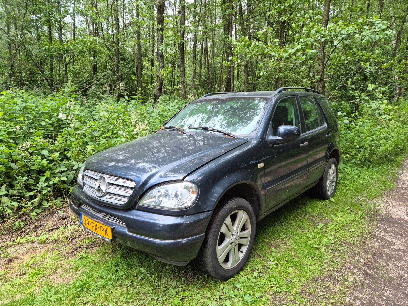 Mercedes-Benz M-Klasse 3.2 Ml320 4MATIC AUT 2000 Zwart, Auto's, Mercedes-Benz, Automaat, 138 €/maand, 2020 kg, Zwart