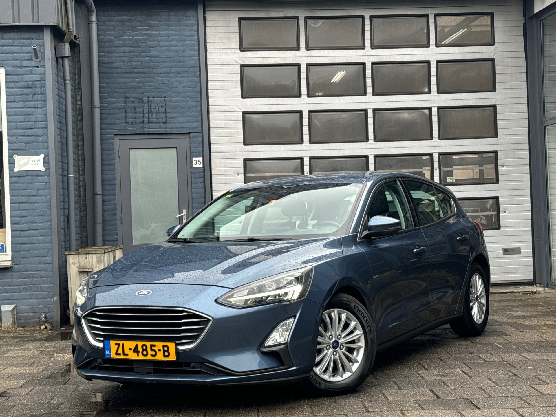 Ford Focus 1.0 EcoBoost Titanium Business | Clima | Cruise |, Auto's, 125 pk, Gebruikt, Euro 6, Blauw