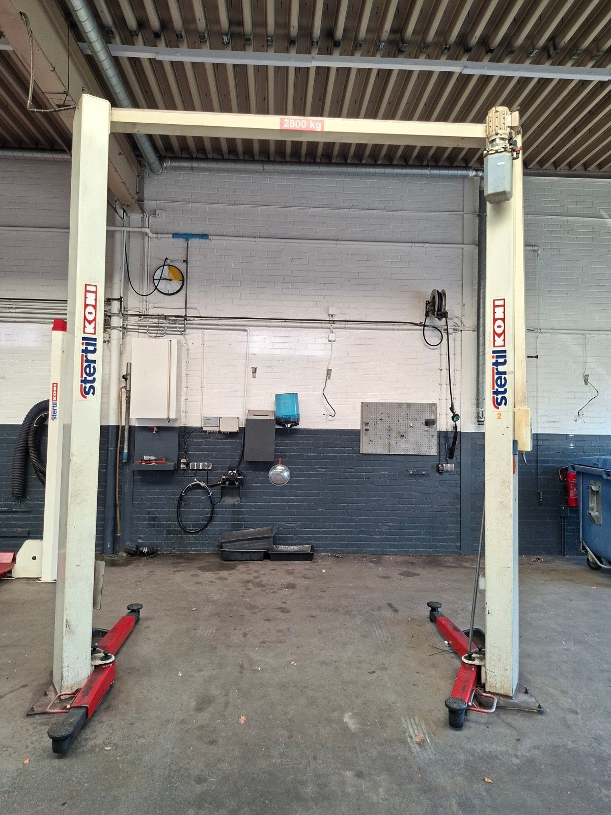 Hefbrug 2 koloms Koni 2800kg vloervrij hydraulisch, Ophalen