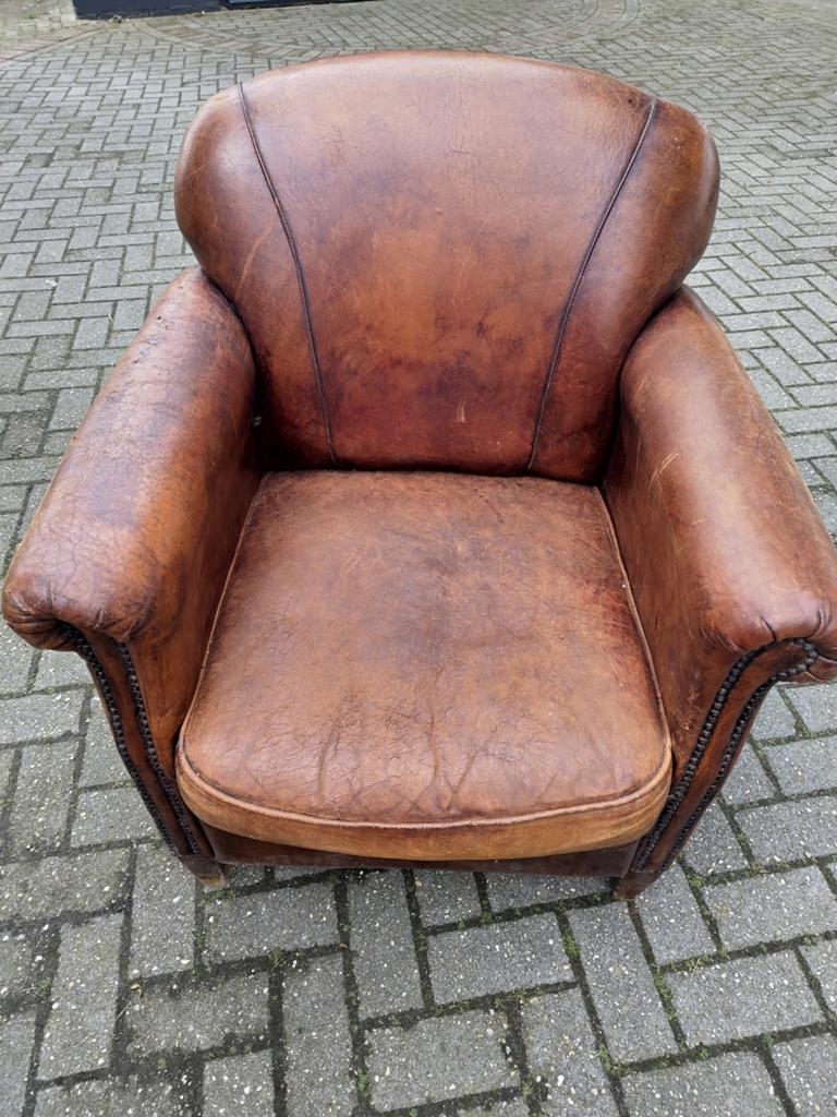 Schapenleren Fauteuil, Ophalen