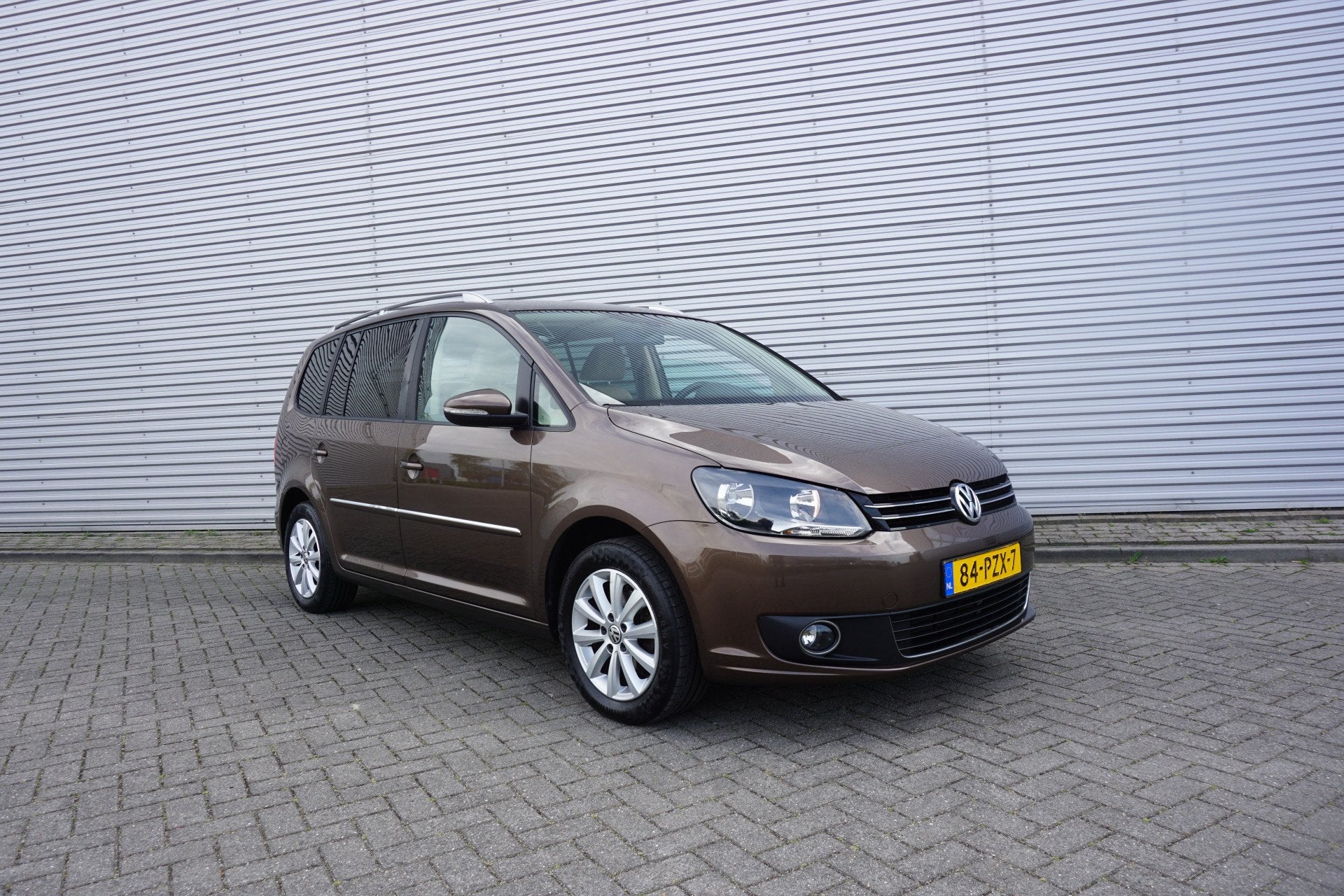 Volkswagen Touran 1.2 TSI Highline BlueMotion Airco / Navi /, Euro 5, Gebruikt, 4 cilinders, Bruin