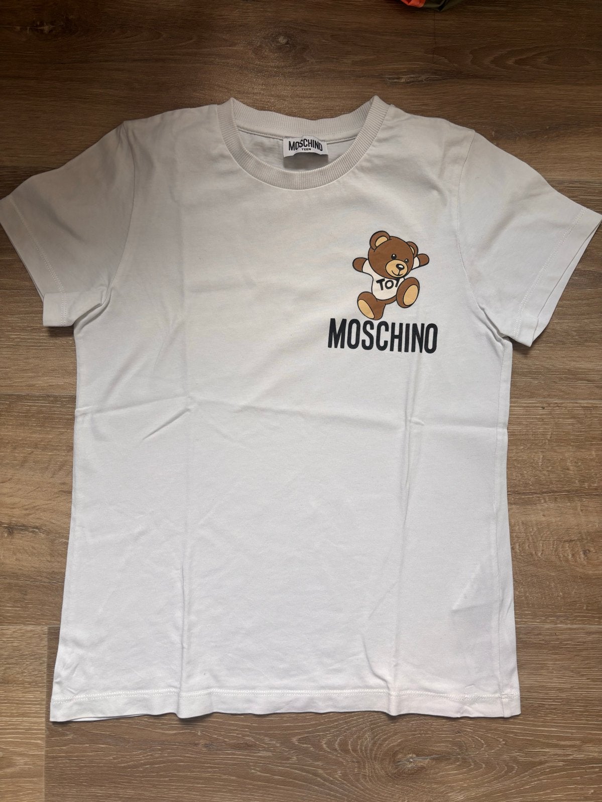 Moschino T-shirt maat 140, Ophalen of Verzenden, Gebruikt, Jongen of Meisje, Shirt of Longsleeve