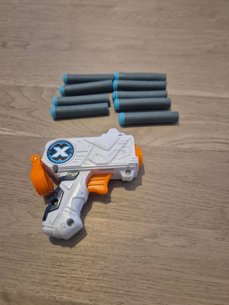 Speelgoed pistool met kogels en schietplaatje, Ophalen, Gebruikt, Meisje