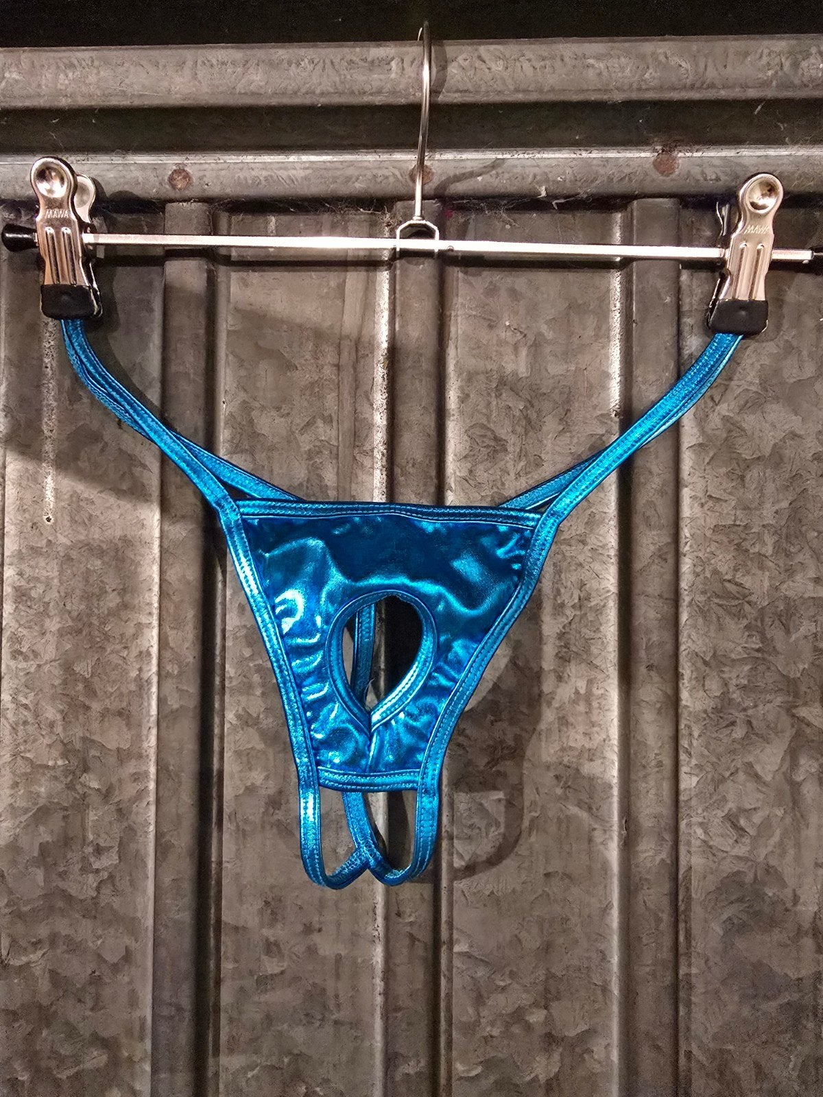 Glanzende blauwe string met open kruis, Verzenden, Blauw