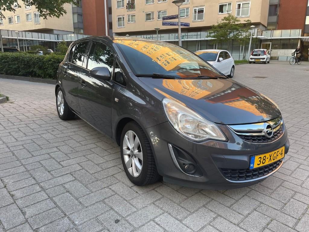 Opel Corsa 1.4 Twinport 100 pk 5-deurs (2012, Grijs), Auto's, Voorwielaandrijving, 4 cilinders, 100 pk, 49 €/maand