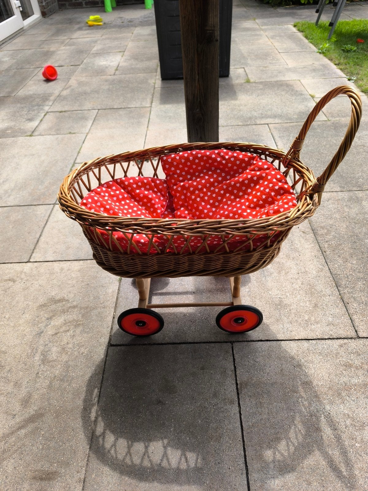 Rieten poppenwagen, Ophalen, Babypop