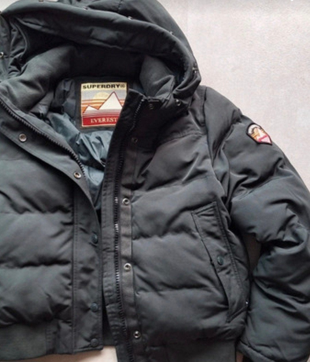Superdry Everest Pufferjack met capuchon - Maat 42, Superdry, Maat 42/44 (L), Ophalen of Verzenden, Gedragen