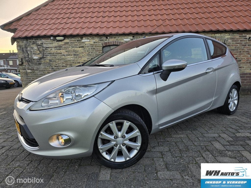 Ford Fiesta 1.25 Ghia nette auto!, Auto's, Voorwielaandrijving, Electronic Stability Program (ESP), 82 pk, Origineel Nederlands