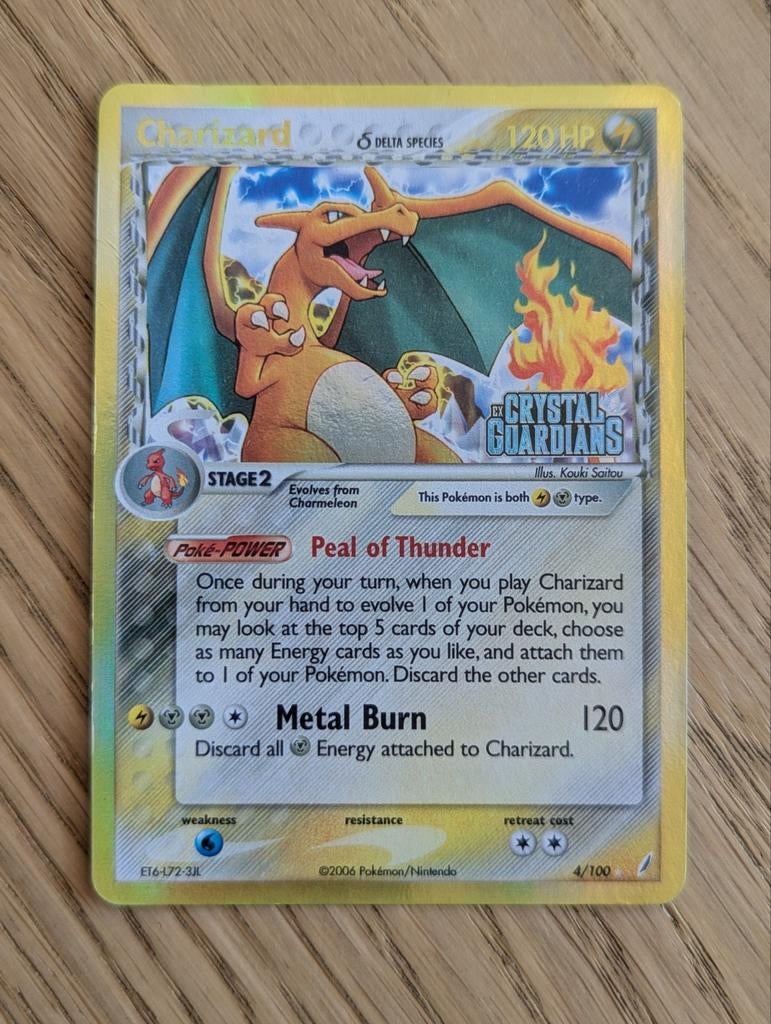 Charizard Delta Species 4/100 Reverse, Ophalen of Verzenden, Zo goed als nieuw