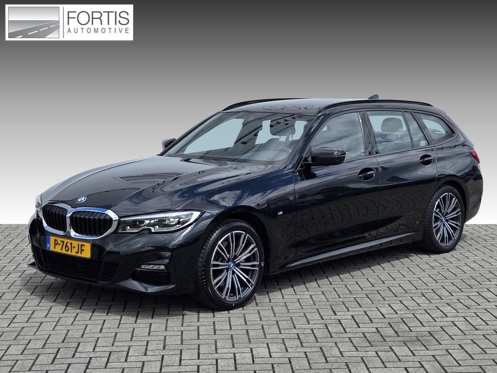BMW 3-serie Touring 320e Business Edition Plus NL-AUTO | LED, Auto's, BMW, 1998 cc, Gebruikt, 4 cilinders, Zwart