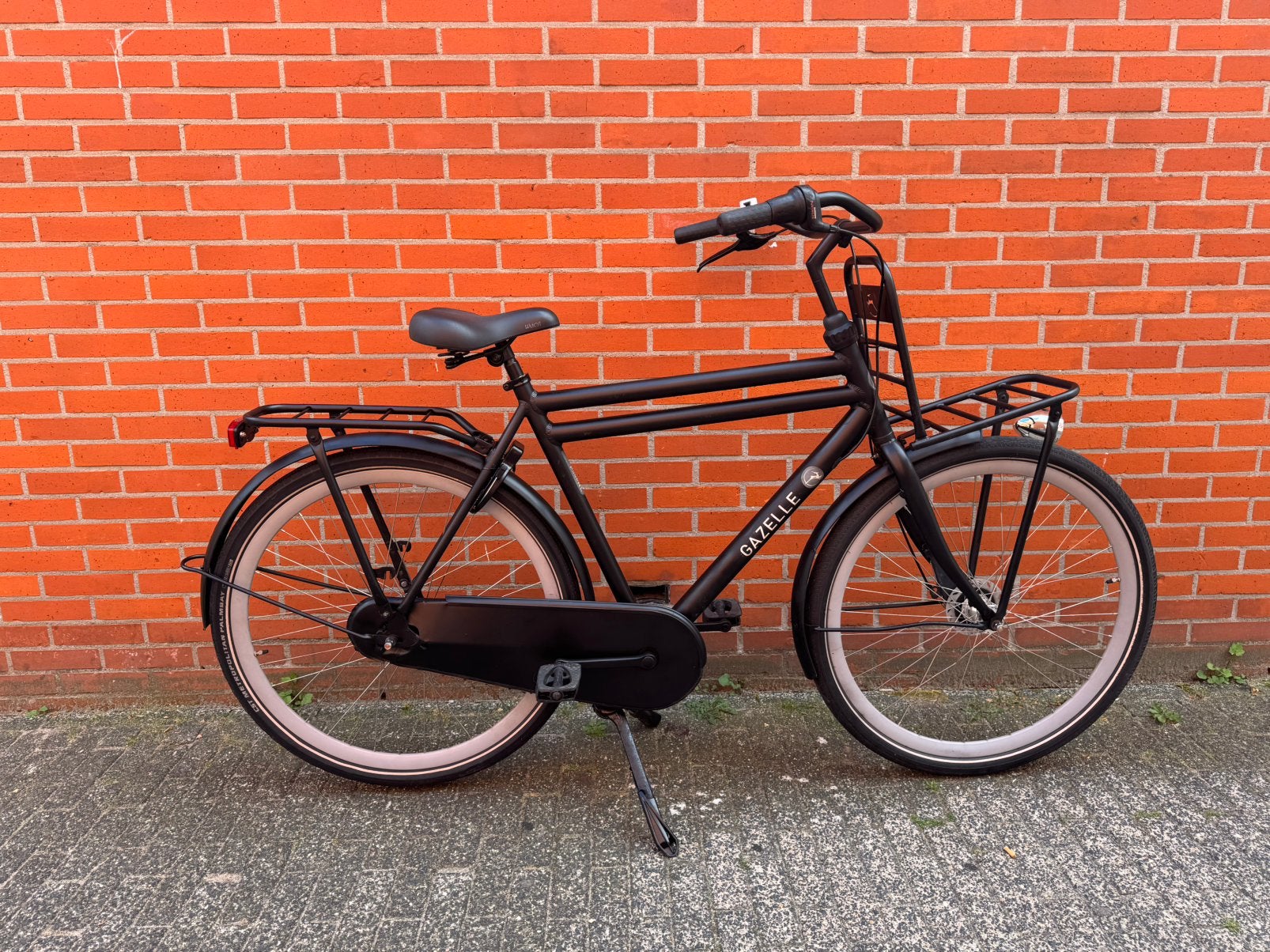 Zwarte Gazelle herenfiets 28 inch stadsfiets 7 versnellingen, Ophalen, Terugtraprem, Versnellingen, Zo goed als nieuw