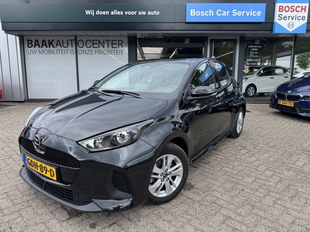 Mazda 2 Hybrid 1.5 Centre-line (bj 2024, automaat), Auto's, Mazda, Gebruikt, Euro 6, 450 kg, Zwart