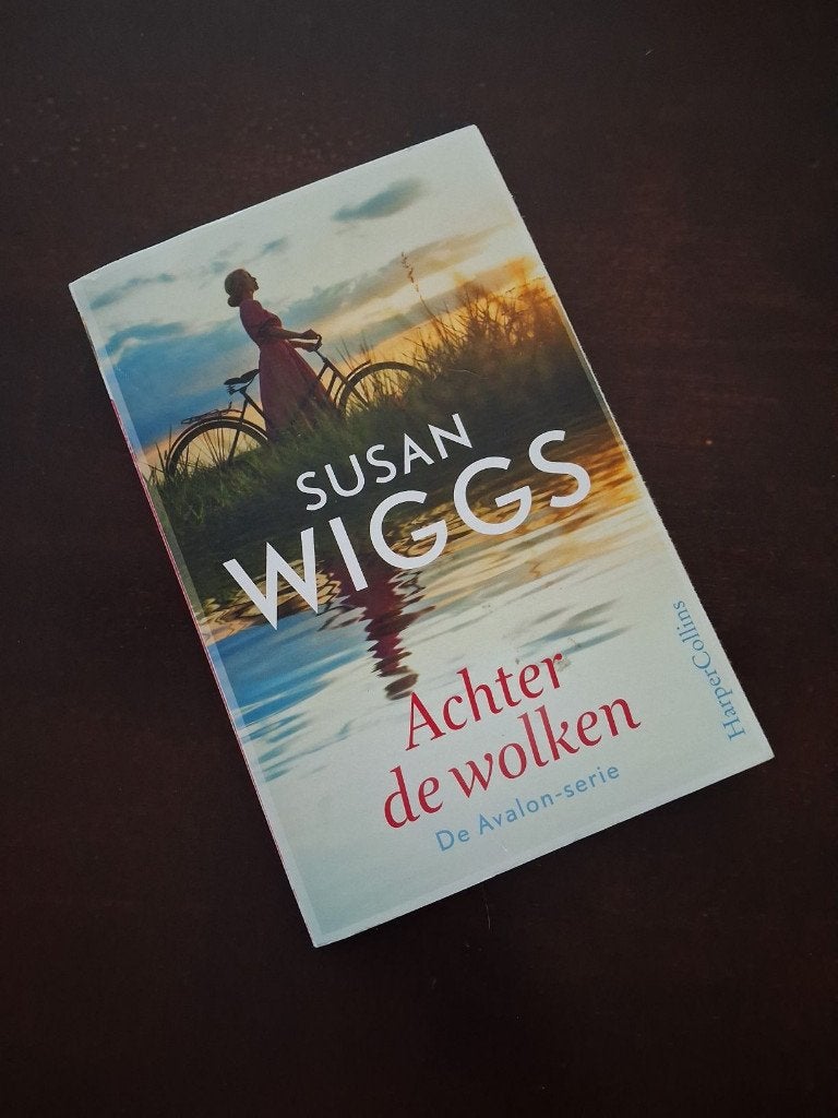 Susan Wiggs - achter de wolken, Boeken, Ophalen of Verzenden, Zo goed als nieuw