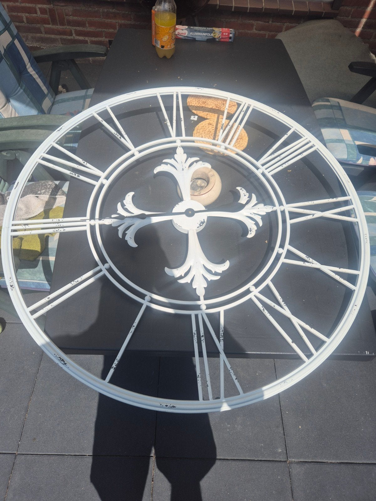 groote want klok 100 cm, Ophalen