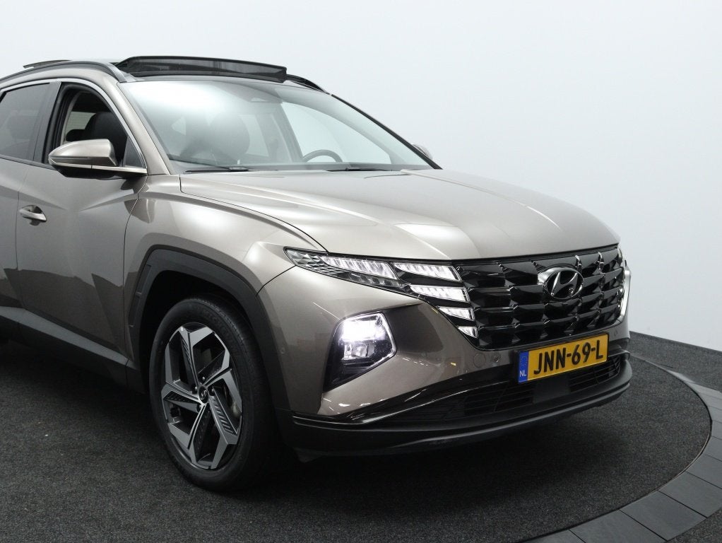 Hyundai Tucson 1.6 T-GDI PHEV Premium Sky | 360 Camera | Sto, Auto's, Hyundai, 14 kWh, Gebruikt, 4 cilinders, Leder