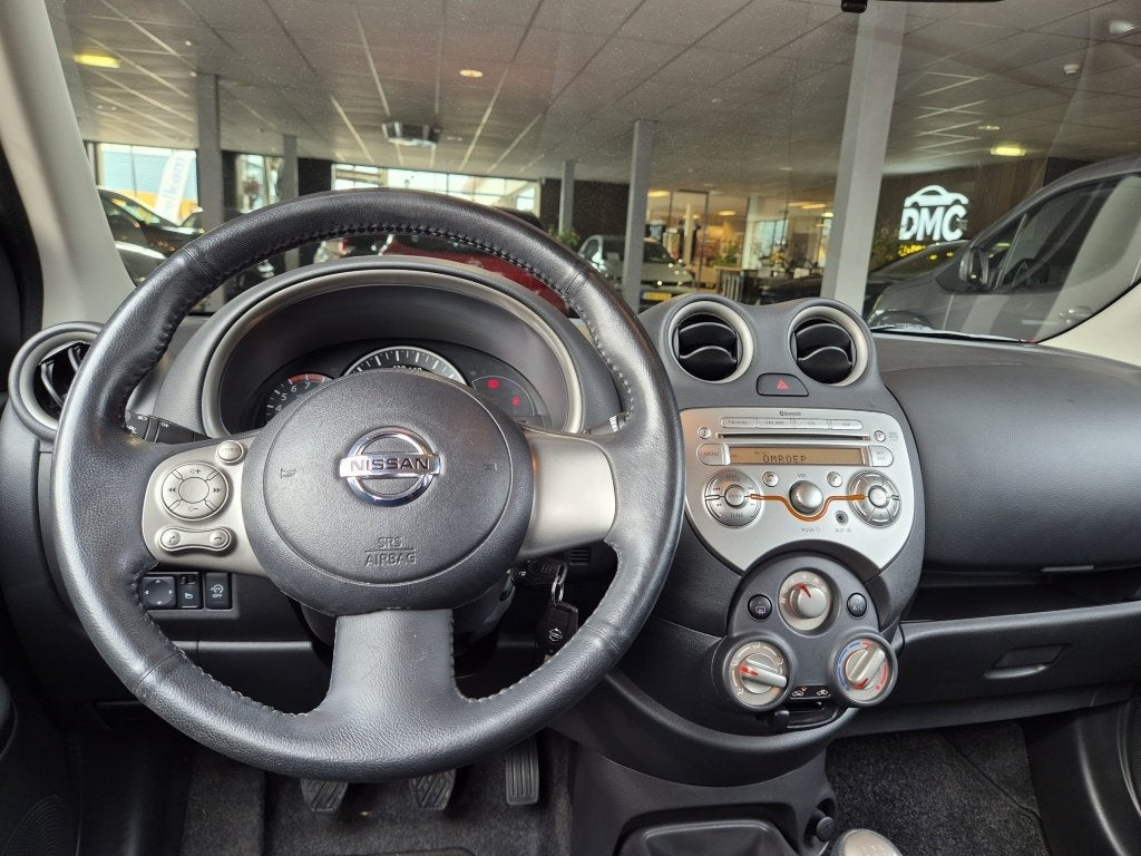 Nissan Micra 1.2 DIG-S Acenta | Airco | Stuurwielbediening |, Keurmerk '100% Onderhouden', Stof, Zwart, 1198 cc