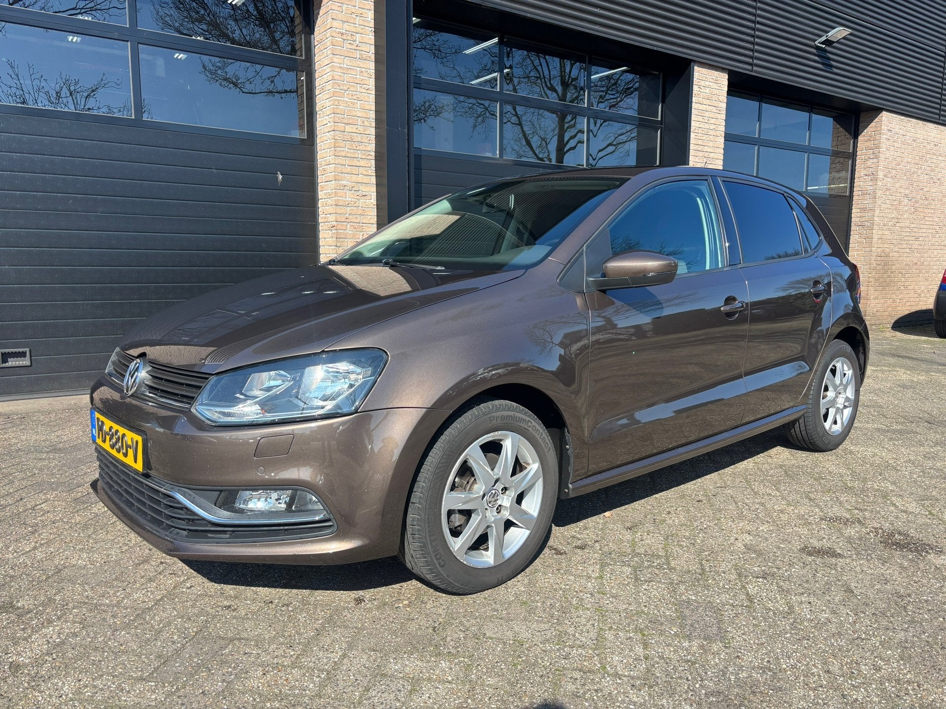 Volkswagen Polo 1.2 TSI Highline 5 drs stoelverwarming, Auto's, Stof, 4 cilinders, Bruin, Bedrijf