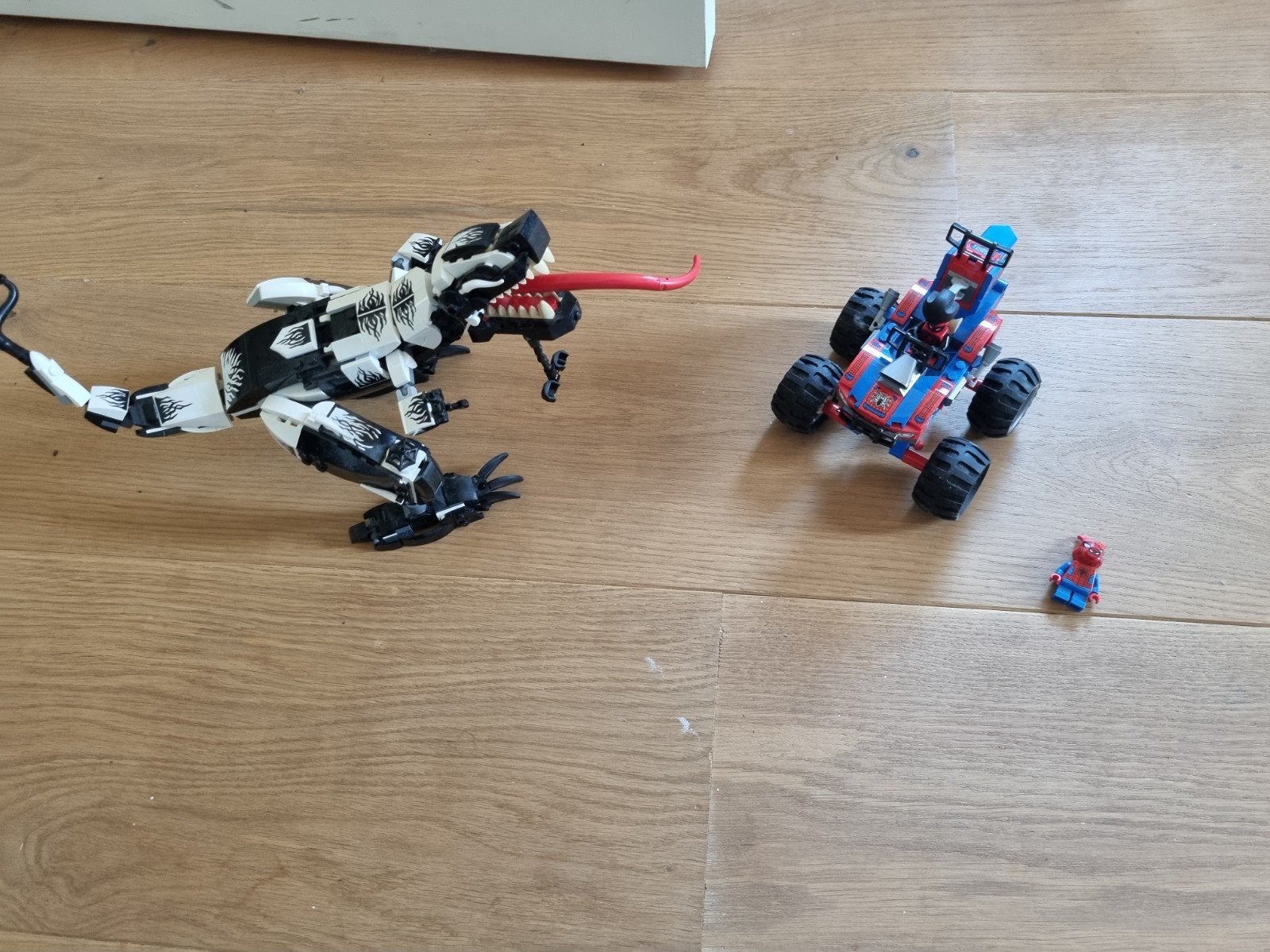 lego venom en spiderman, Ophalen