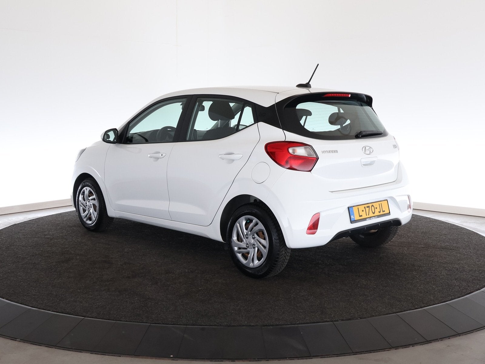 Hyundai i10 1.0 Comfort (bj 2021), Auto's, Stof, Gebruikt, 899 kg, Wit