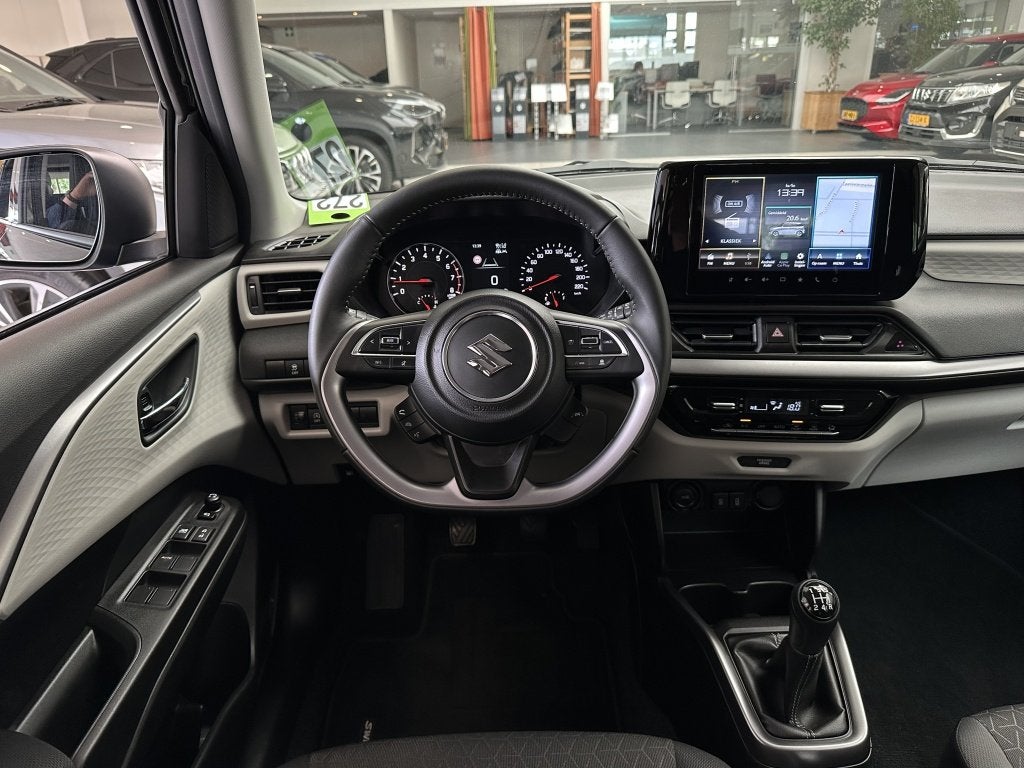 Suzuki Swift 1.2 Style Smart Hybride [ 10JAAR GARANTIE I CAR, Auto's, Suzuki, 12 maanden, Stof, Gebruikt, Zwart