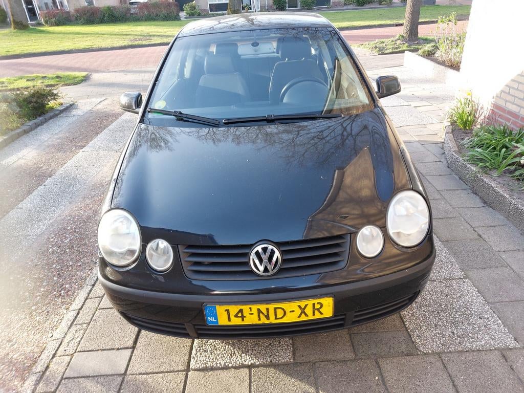 Volkswagen Polo 1.4 55KW 2003 Zwart, Auto's, Voorwielaandrijving, 4 cilinders, Zwart, Origineel Nederlands