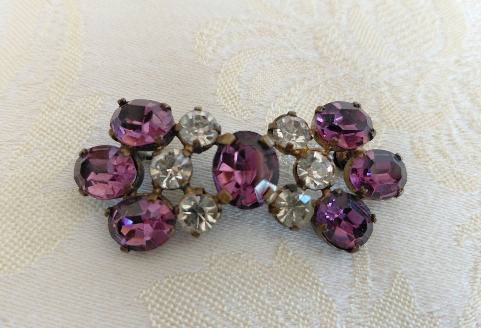 Antieke Broche met Paars/Witte Rijnstenen., Sieraden, Tassen en Uiterlijk, Antieke sieraden, Ophalen of Verzenden, Overige materialen