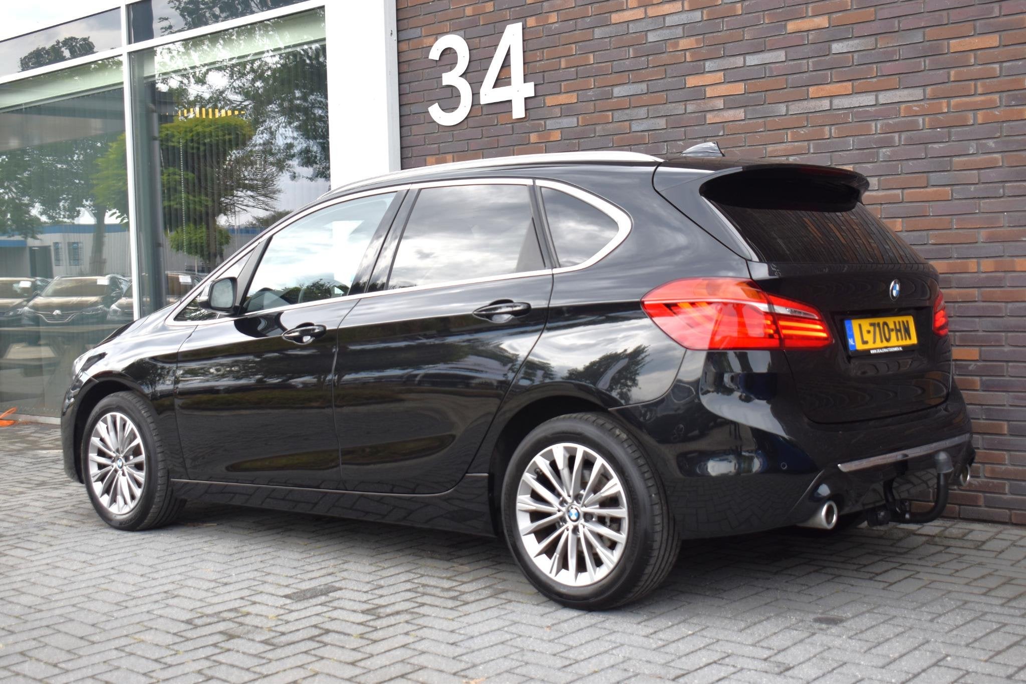 BMW 2-serie Active Tourer 220i Business Edition Plus, 4 cilinders, Zwart, 1390 kg, MPV