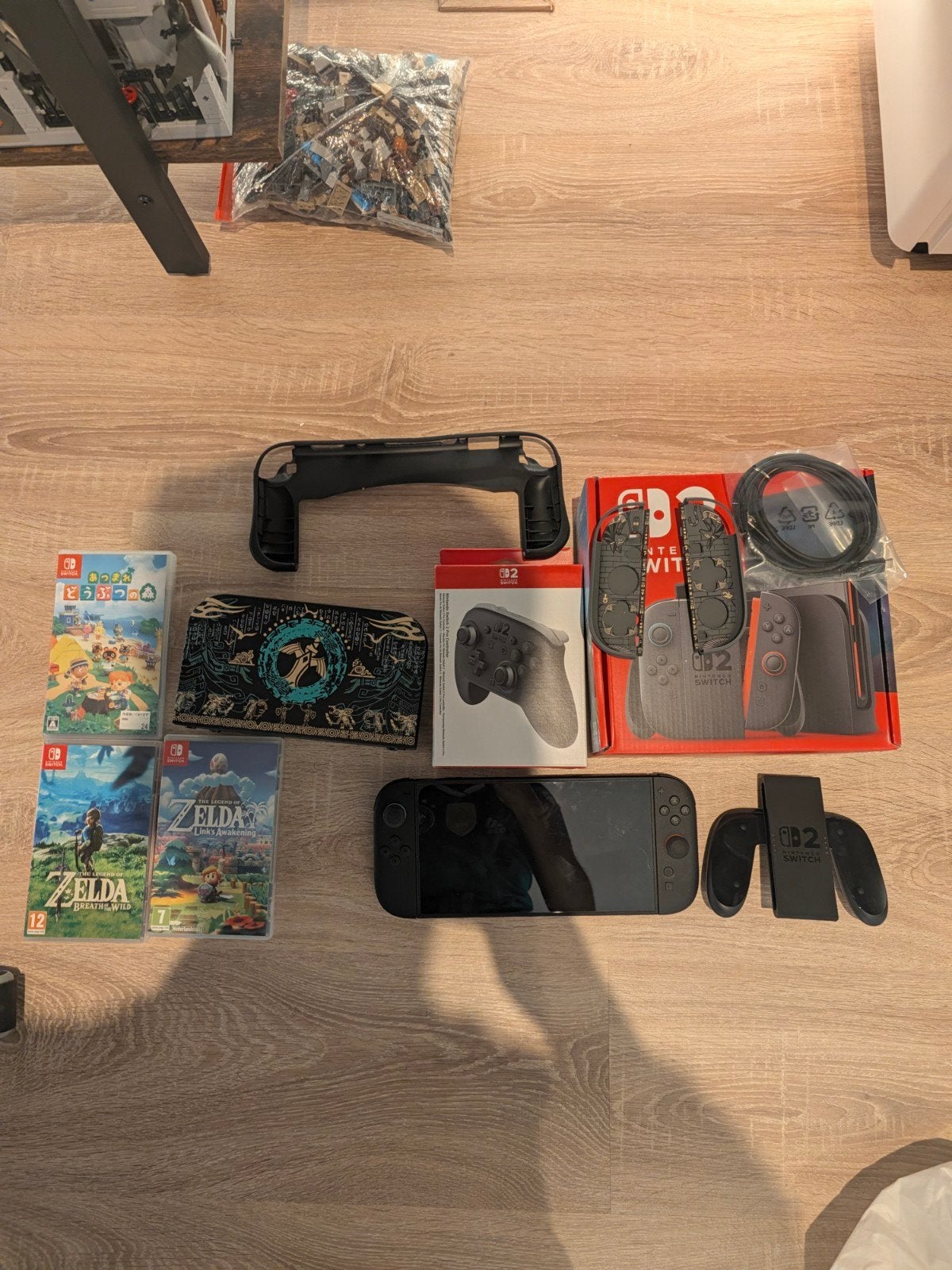 Foto 2 van Nintendo Switch 2 met accessories en games