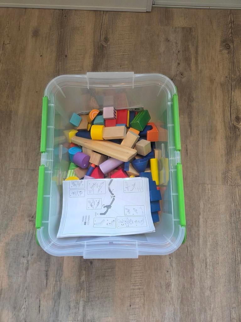 Blokkendoos met houten en gekleurde blokken, Ophalen