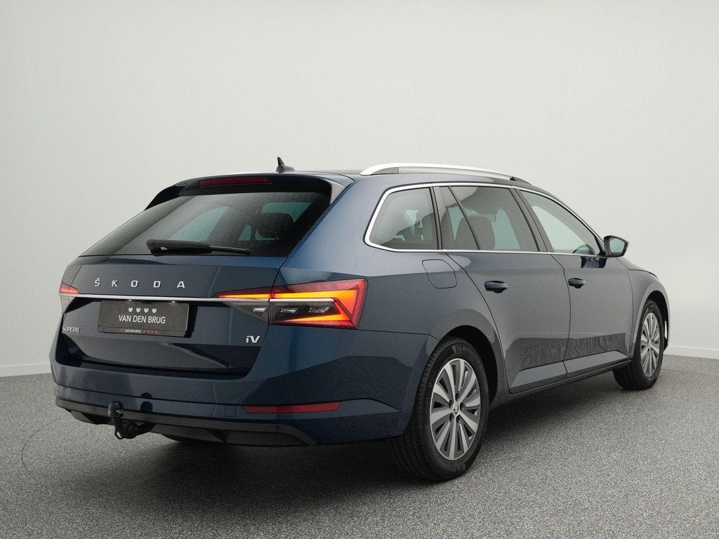 Skoda Superb Combi 1.4 TSI 218pk iV Business Edition Plus |, Auto's, Skoda, Stof, Gebruikt, 4 cilinders, Blauw