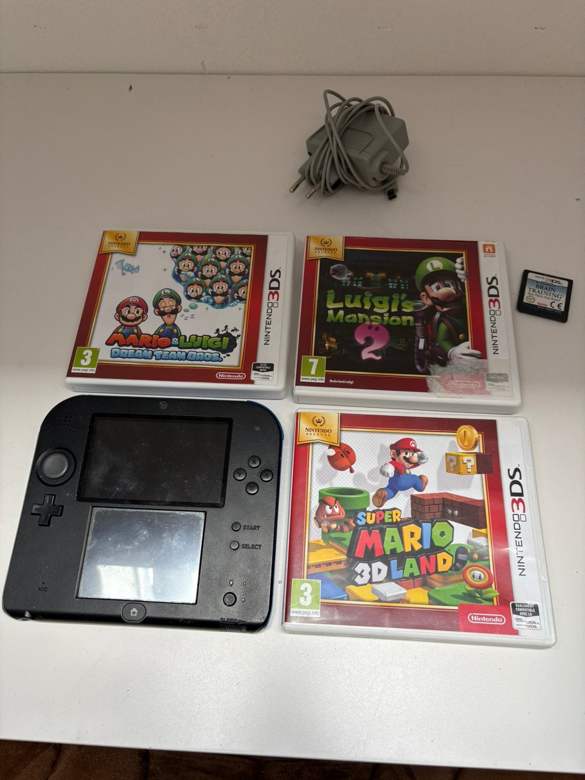 Nintendo 2ds incl 4 spellen, Blauw, 2DS, Ophalen of Verzenden, Gebruikt