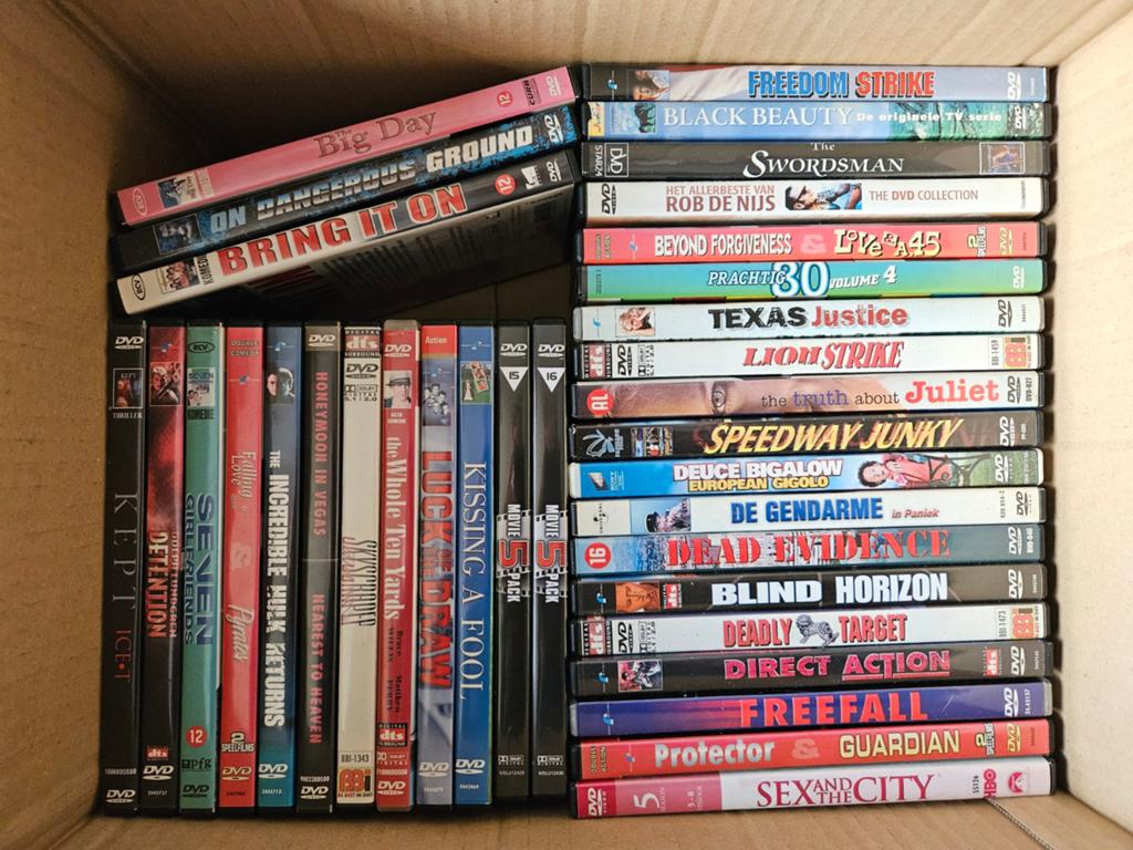 Doos DVD's met meer dan 30 films, Ophalen of Verzenden, Gebruikt