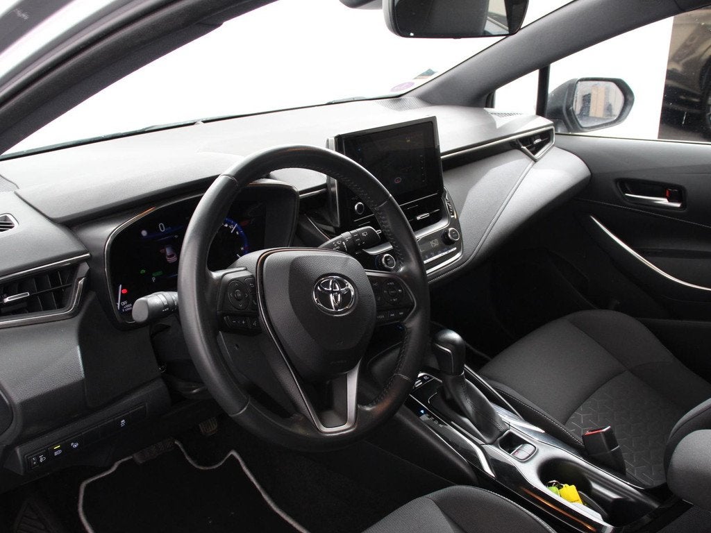 Toyota Corolla Touring Sports 1.8 Automaat Hybrid Business C, Stof, Gebruikt, Euro 6, 4 cilinders