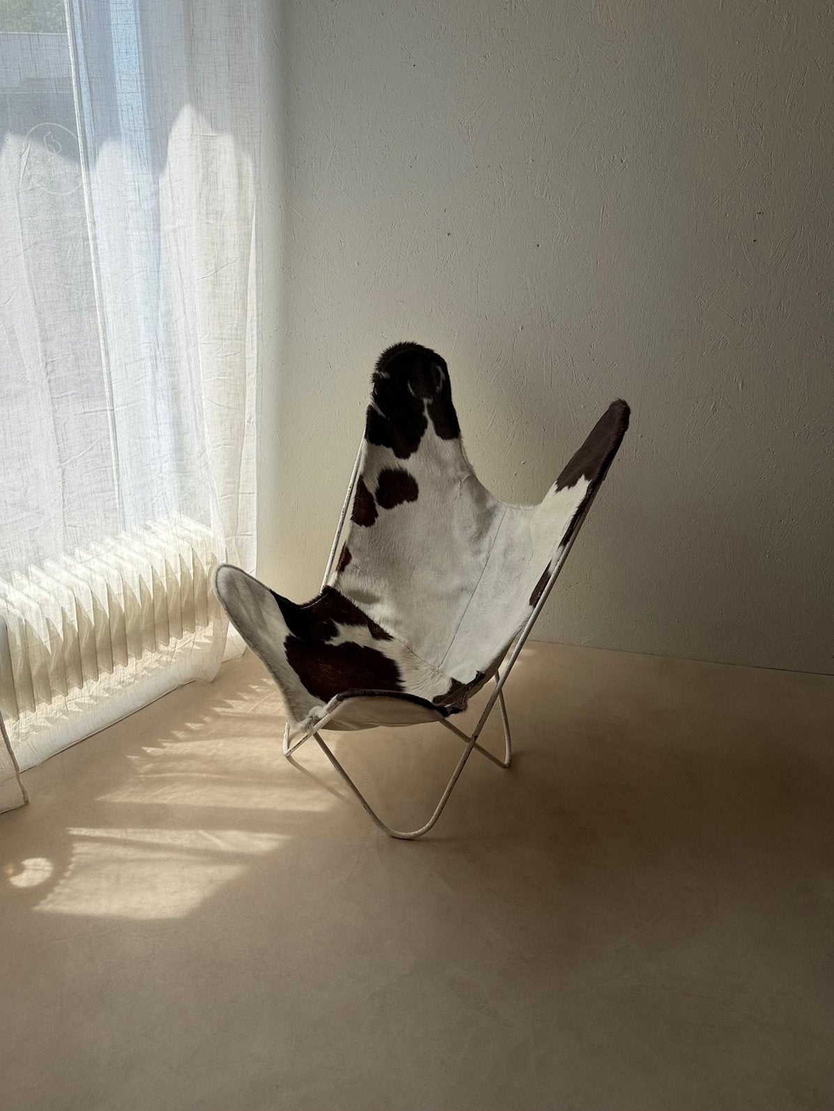 Vintage Butterfly fauteuil met koeienhuid bekleding, Ophalen of Verzenden, Gebruikt, Leer, Mid century